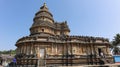 Devotees at.Vidyashankara Temple, rich with sculpted plinth, six doorways and twelve pillars surrounding the mandapa with figures