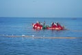 India, Kerala - December 27, 2015: Indian fishermen graphically pull painted Seine right in boat 2. Net painted in bright colors,