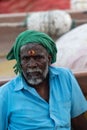 India, Kerala January 15, 2023: A man wearing a national headgear with a bindi