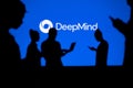 INDIA, NEW DELHI. JANUARY 30, 2023: DeepMind from Google. Innovating Together: Silhouetted Web Developers Uniting for Progress