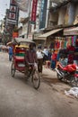 Rickshaw bike taxi in search of customers at the Main Bazaar Paharganj in Indian capital