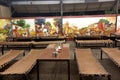 India open restaurant interior with traditional sitting arrangement - Image