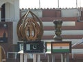 India and Pakistan Emblems and Flags at the Attari-Wagah border in Punjab,India