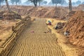INDIA. Production of adobe bricks by hand Royalty Free Stock Photo