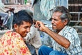 India Rajasthan Jodhpur. Street barber\'s shop Royalty Free Stock Photo