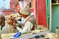 India. Varanasi Benares Uttar Pradesh. Barber\'s shop