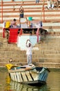 India. Varanasi Benares Uttar Pradesh. Sacred ablutions on the river Ganges Royalty Free Stock Photo