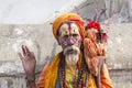 India - Varanasi. A holy man, sadhu looking into the camera.