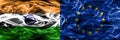 India vs EU smoke flags placed side by side. European Union flag
