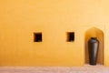 Indian Antiques Pottery with classic old wall of Amber fort. Amber fort its large ramparts Constructed of red sandstone and marble