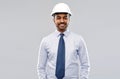 Indian architect or businessman in helmet