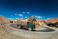 Indian army lorry on road in Himalayas Royalty Free Stock Photo