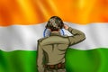 Indian Army soilder saluting falg of India with pride Royalty Free Stock Photo