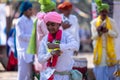 Indian artist performing folk activities at Surajkund craft fair