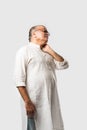 Indian senior or old man having ache or body pain, sad expressions Royalty Free Stock Photo