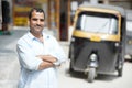 Indian auto rickshaw tut-tuk driver man Royalty Free Stock Photo