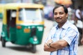 Indian auto rickshaw tut-tuk driver man Royalty Free Stock Photo
