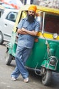 Indian auto rickshaw tut-tuk driver man