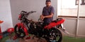 indian automobile engineer modified motorcycle at bajaj automobile service center in India aug 2019