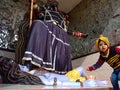 an indian baby boy touching feet of lord Shiva at temple in india dec 2019