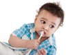 Indian baby brushing teeth Royalty Free Stock Photo