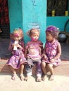 Indian baby talking each other in holi festival .