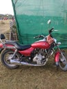 Indian bajaj old bike in red colour