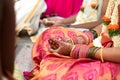Indian Bangles and henna in the hands of bride Royalty Free Stock Photo
