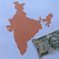 Indian banknote and background with India map silhouette Royalty Free Stock Photo