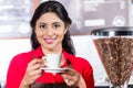 Indian barista offering coffee Royalty Free Stock Photo