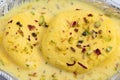 Indian Bengali Chhena Mithai Rasmalai Also Known As Rossomalai Roshmolai Rasamalei Ras Malai Made Of Fresh Curdled Milk Pista