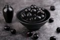 Indian Black Berry or Jamun Fruit, Java Plum in a Black Bowl - H