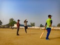 an indian boy holded cricket bat during match at playground in India January 2020 Royalty Free Stock Photo