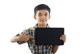 Indian boy holding tablet Royalty Free Stock Photo