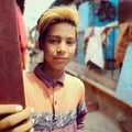 Indian boy in kathputli colony, Delhi street performers.