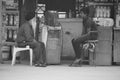 An indian boy talking with old sardar man on a tea shop Royalty Free Stock Photo