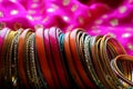 Indian bracelets on beautiful shawl. Indian fashion