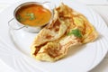 Indian bread or Roti telur with curry sauce