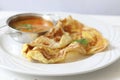 Indian bread or Roti telur with curry sauce Royalty Free Stock Photo