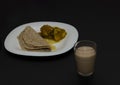Indian Breakfast Chapati, Egg Roast And Tea Royalty Free Stock Photo