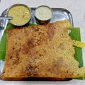 Indian breakfast consisting of Rava Masala Dosa served with curry and chutney Royalty Free Stock Photo
