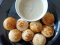 Indian breakfast guliyappa and chatni ina plate