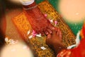 Close up of Indian bride and groom holding hands after the wedding ceremony, Royalty Free Stock Photo