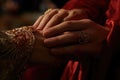 Indian bride and groom holding hands on wedding day, close-up, Giving of the wedding ring, a close-up of the hand, AI Generated Royalty Free Stock Photo
