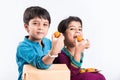 Indian brother and sister celebrating rakshabandhan or rakhi festival