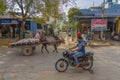 Indian bullock cart or ox cart run by man in village.