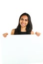 Indian Business Woman displaying white placard for your text.