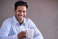 Indian businessman, coffee and smile portrait on work break, professional and happy isolated on grey background. Stock