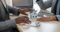 Indian businessman is having a discussion with an African American real estate agent Royalty Free Stock Photo