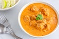 Butter Chicken in a Bowl with Rice on White Background Royalty Free Stock Photo